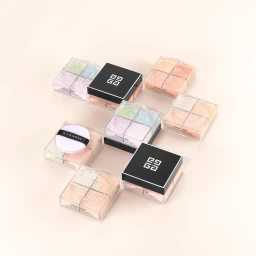 Givenchy makeup powder compacts arranged on a clean light background with black and clear plastic packaging