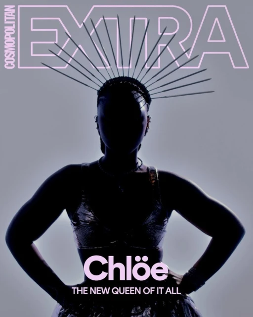 Cosmopolitan EXTRA cover featuring a silhouetted figure of a woman wearing a spiky halo-like headpiece, hands on hips, against grey backdrop.