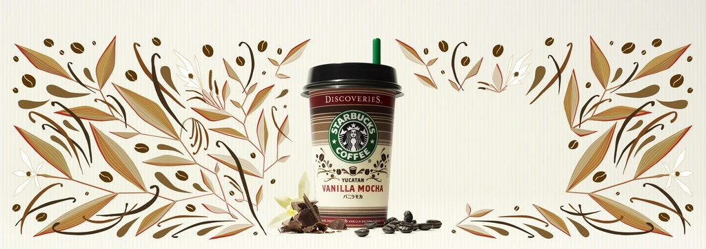 Starbucks Discoveries Vanilla Mocha in tall cup surrounded by coffee beans, vanilla bean, and floral pattern on striped background.