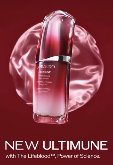 Shiseido Ultimune Power Infusing Concentrate bottle on a red background with a translucent sphere behind it for beauty advertising.