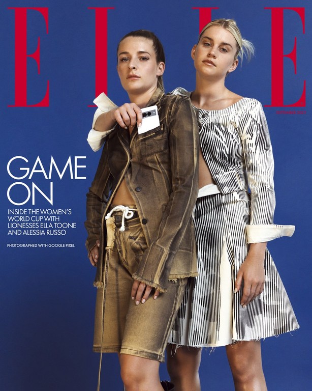 Elle magazine cover featuring two adult women in fashionable outfits against a solid blue background, showcasing a blend of style.