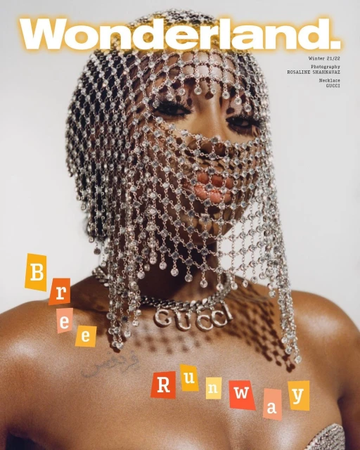 Wonderland Magazine cover featuring a Black female model with a silver mesh headpiece and Gucci necklace on a white background.