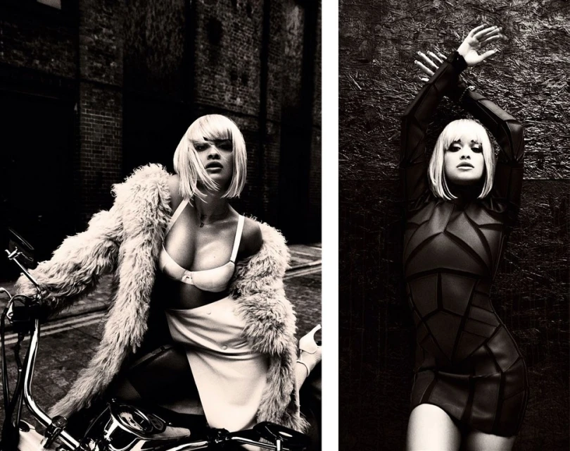 Monochrome fashion shot of two women: one on a motorcycle in a fur coat, and another in a form-fitting geometric-patterned dress against a dark wall.