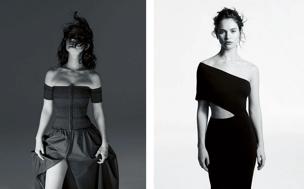Two women pose in black and white studio fashion editorial. The woman on the left wears an off-the-shoulder dress and the other a cutout dress.