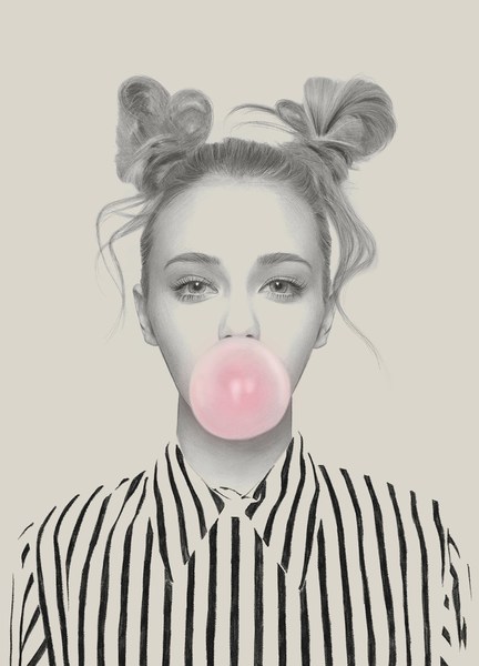 Eye-level close-up portrait of a young woman blowing a pink bubble with her hair in space buns and wearing a striped shirt against a beige background.