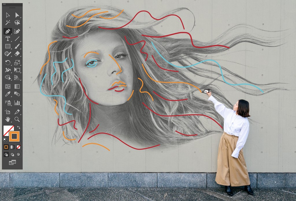 Woman photographs large-scale female portrait illustration with colored lines on a concrete wall outside in an urban environment.