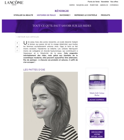Digital advertisement for Lancôme featuring a pencil-style portrait of a woman winking, set against a website layout with skincare product promos.