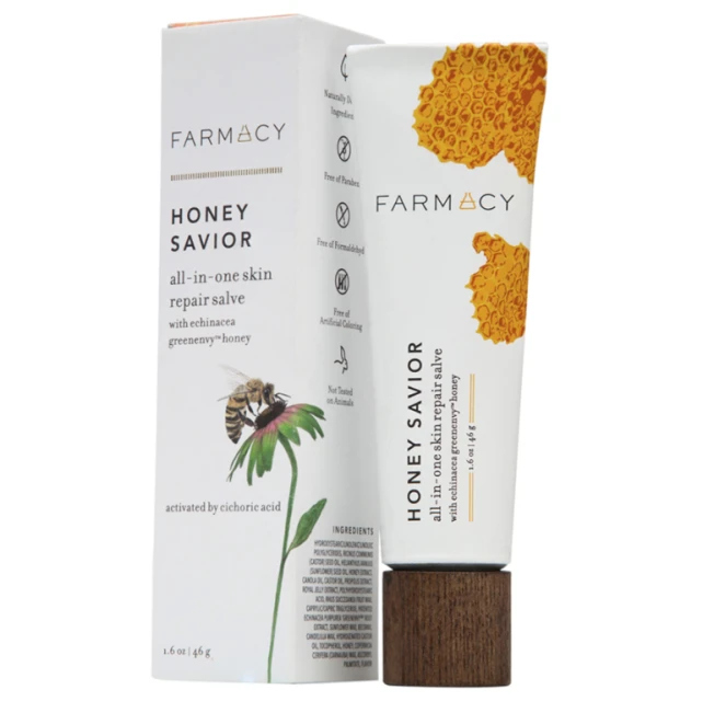 Farmacy Honey Savior all-in-one skin repair salve with echinacea greenenvy honey sits on a white surface in studio lighting.