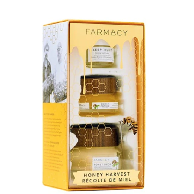 Close-up of a Farmacy honey skincare set in a yellow box, featuring honey pots, a bee illustration, and vintage graphics.