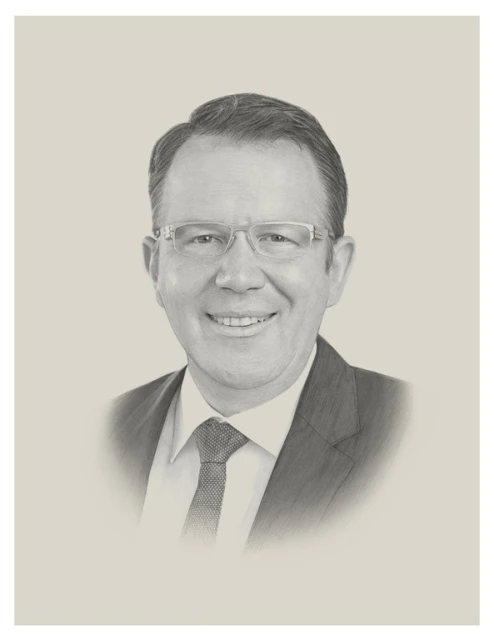 Pencil art portrait of an adult man wearing glasses, a suit, and a tie against a neutral background with a vignette effect.