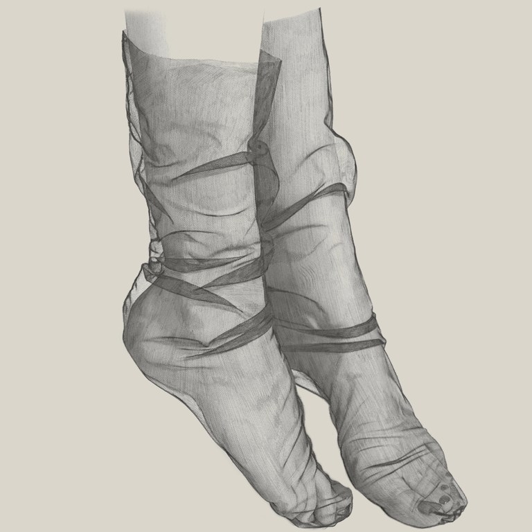 Close-up of two legs adorned with sheer, dark gray socks, showcasing the fabric's delicate texture and form-fitting design against a neutral backdrop.