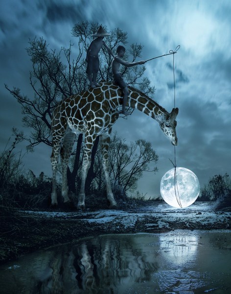 Two boys ride a giraffe at night next to a glowing moon-like sphere over water, surreal fantasy scene with trees and cloudy sky.
