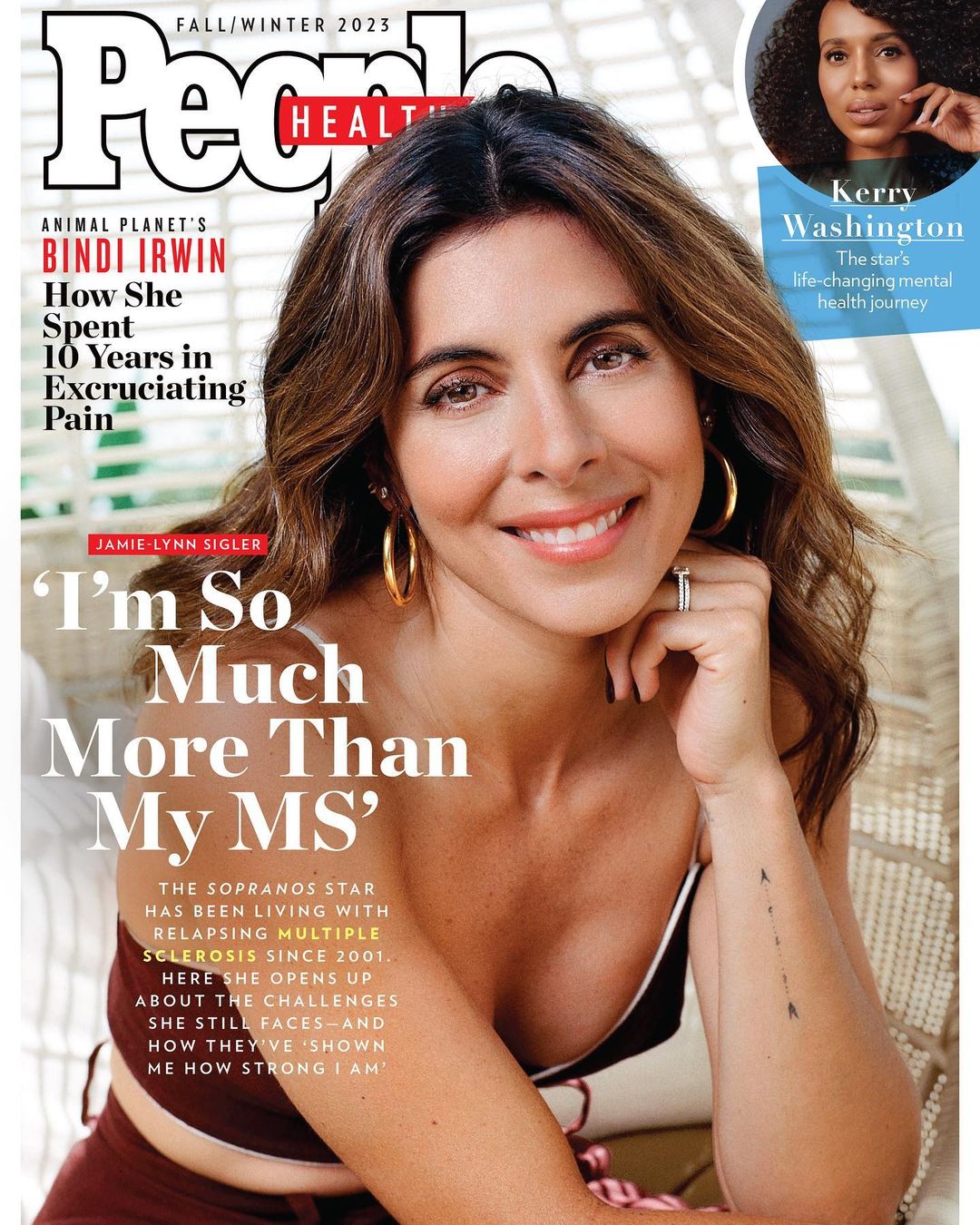 Jamie Lynn Sigler on People Health cover, Fall/Winter 2023. Close-up of smiling woman with brown hair, gold earrings, and arm tattoo.