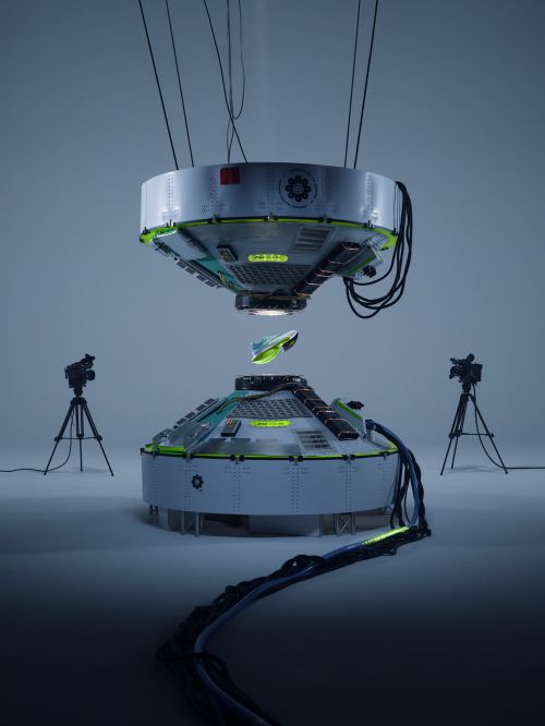 An artful product photography image showcasing a futuristic green shoe suspended between two industrial, metallic, robotic-looking platforms.