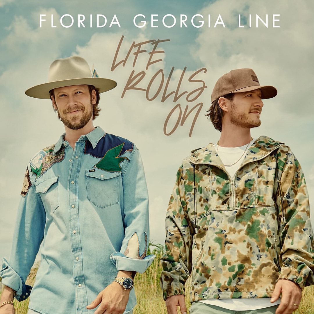 Album cover featuring the country music duo Florida Georgia Line posing in front of a grassy field. The album title is 'Life Rolls On'.