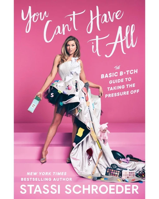 Woman in a book cover: You Can't Have It All, by Stassi Schroeder, on a pink background with pink stairs, New York Times Bestselling Author.