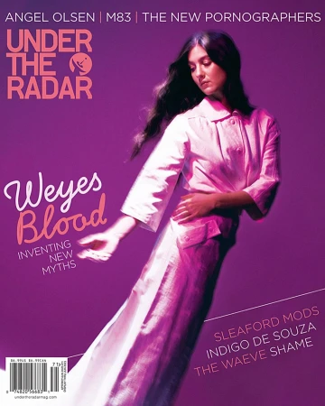 Magazine cover featuring Weyes Blood in a white dress against a purple backdrop with band names and the publication 'Under the Radar'.