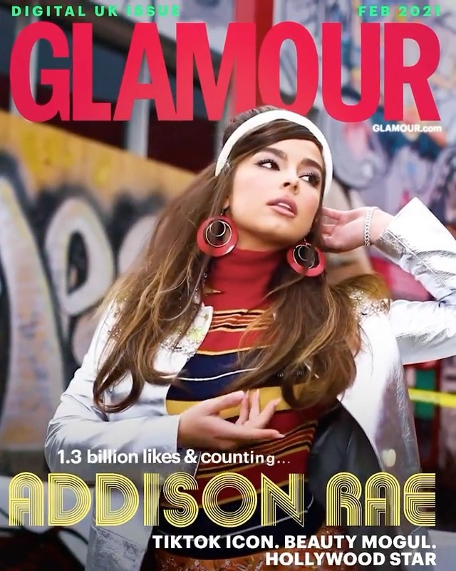 Glamour magazine cover featuring Addison Rae, a young woman with long brown hair, wearing a retro outfit against a graffiti background.