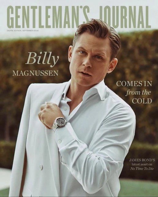 Gentleman's Journal cover featuring Billy Magnussen in white suit jacket and shirt, outdoors against a green foliage background.