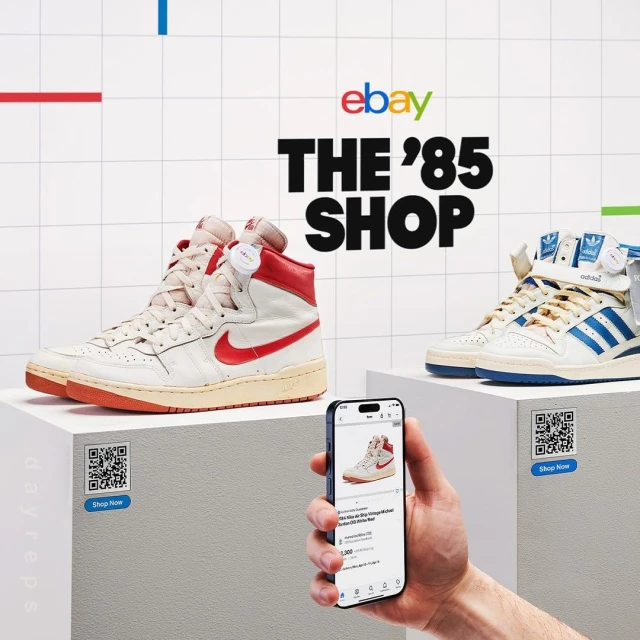 Ebay's '85 Shop showcases vintage high-top sneakers displayed on white pedestals, along with a mobile phone and a QR code.
