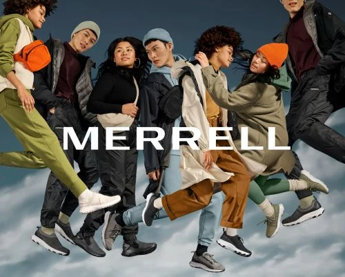 Group of diverse young adult models in athletic wear pose in a promotional shot for Merrell shoes and apparel against a gradient blue background.