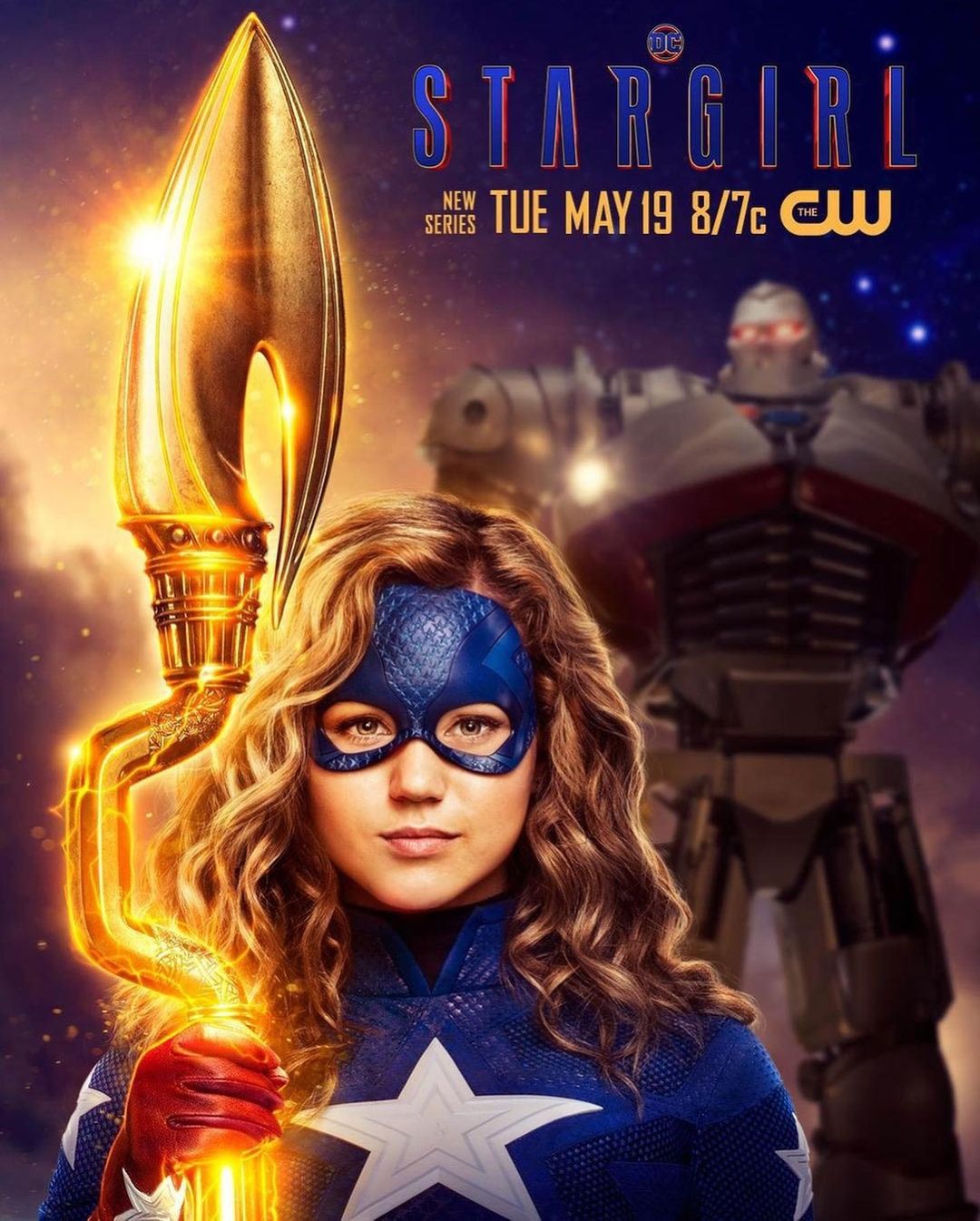 Promotional poster for Stargirl shows the DC Universe character holding a glowing staff with robot figure in the background.