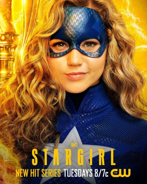 Promotional shot of Stargirl, played by a blonde woman in a blue superhero costume with the show's logo in the lower portion of the image.