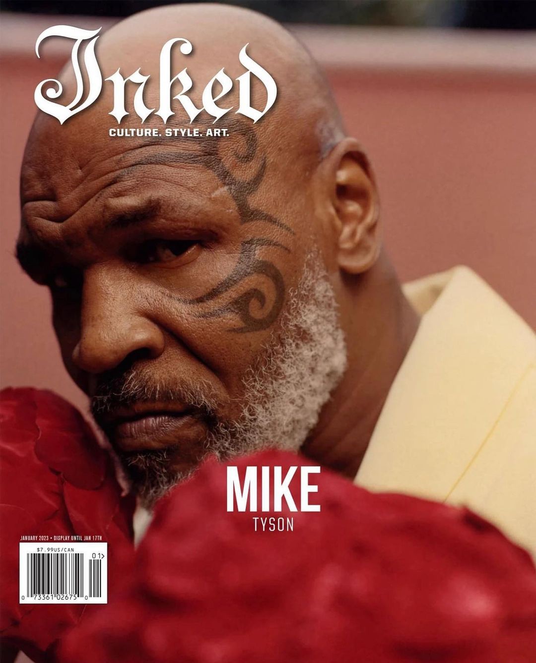 Mike Tyson on the cover of Inked magazine, featuring his facial tattoo, boxing gloves, and the magazine's logo.
