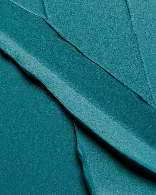 Abstract teal background showcasing a smooth, creamy texture with directional strokes and subtle variations in tone and light.
