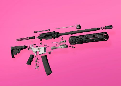 Exploded view of an AR-15 rifle against a vibrant pink background, showcasing its individual components arranged in a precise layout.