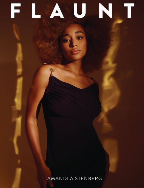 Portrait of Amandla Stenberg on a magazine cover, wearing a sleek black dress with thin straps, set against a warm brown background.