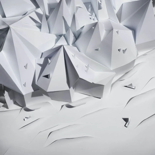 Abstract geometric paper art installation with triangular and pyramidal shapes in a monochromatic white color palette, minimalist design.