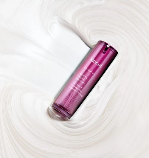 Elegant pink Murad skincare serum bottle lies diagonally on a swirling off-white surface, conveying luxury and beauty.