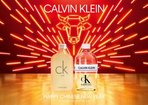 Two Calvin Klein perfume bottles, CK One and CK Everyone, are displayed against a red and yellow Chinese New Year themed background.