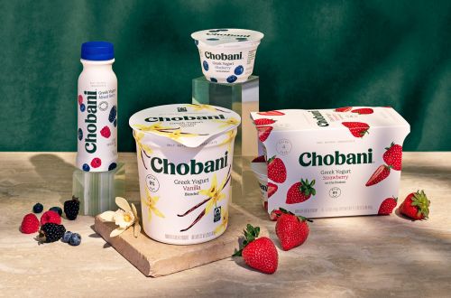 Assortment of Chobani Greek yogurts and yogurt drinks in variety of flavors, including vanilla, strawberry, and mixed berries.