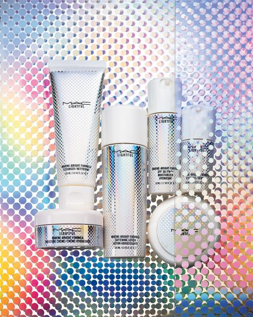 Cosmetic product line of cleansers, lotions, and creams by MAC. Packaging in white and holographic silver with colorful dot background.
