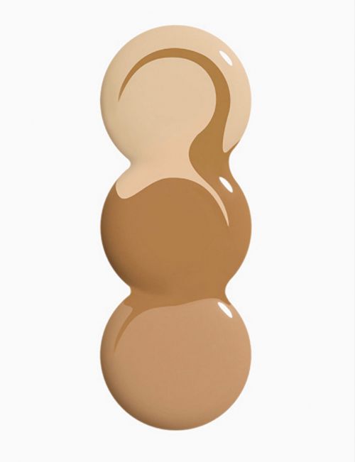 Three stacked drops of different shades of liquid foundation, ranging from light beige to medium tan, on a white background.
