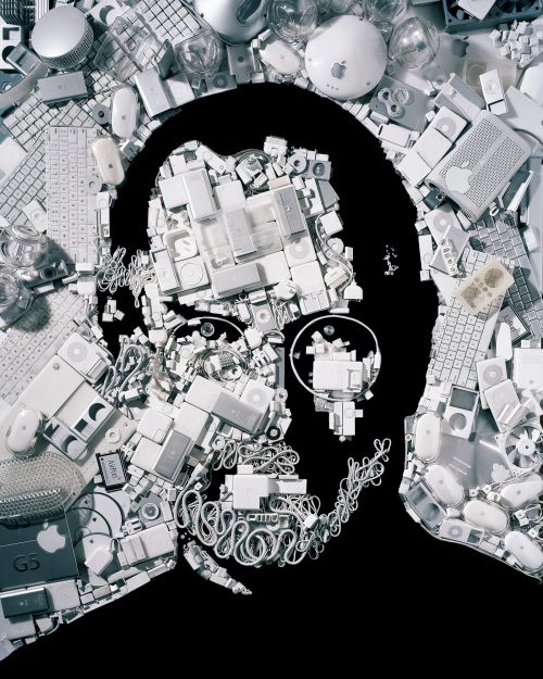 Conceptual image of Steve Jobs' silhouette filled with Apple computer hardware, keyboards, mice, and cables on a black background.