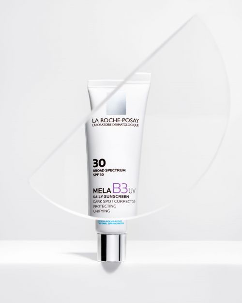 La Roche-Posay Mela B3 UV sunscreen tube on white, showcasing dermatology product in a minimalist studio setting.