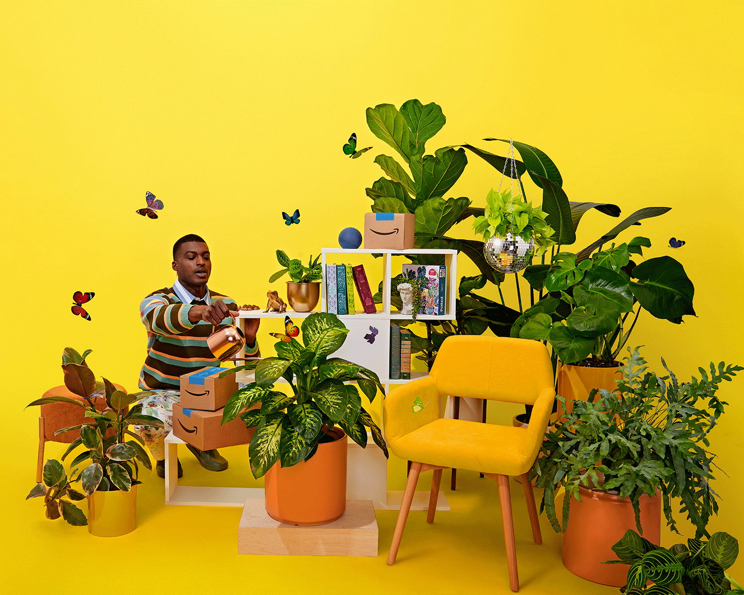 Man preparing brown cardboard boxes among houseplants with a bright yellow background, creating a cheerful and eco-friendly atmosphere.