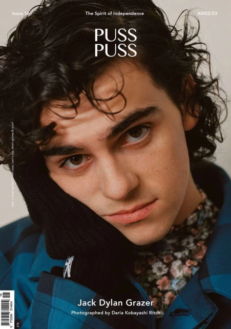 Magazine cover featuring a close-up studio portrait of actor Jack Dylan Grazer, with his dark hair, brown eyes, and a casual outfit.