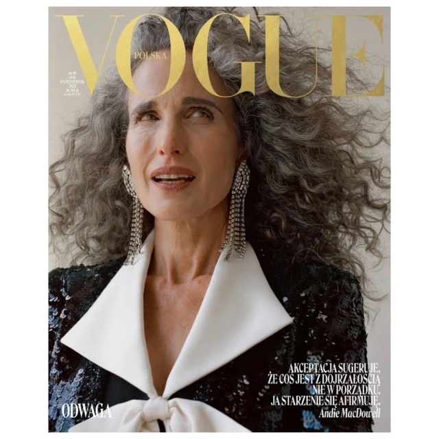 Magazine cover featuring Andie MacDowell, an adult female with grey curly hair, wearing a sequined jacket, and statement earrings.