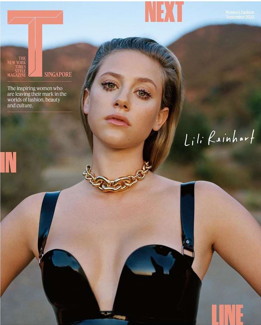 Magazine cover featuring model Lili Reinhart in a glossy black top, bold gold chain, set against an outdoor desert-mountain backdrop.