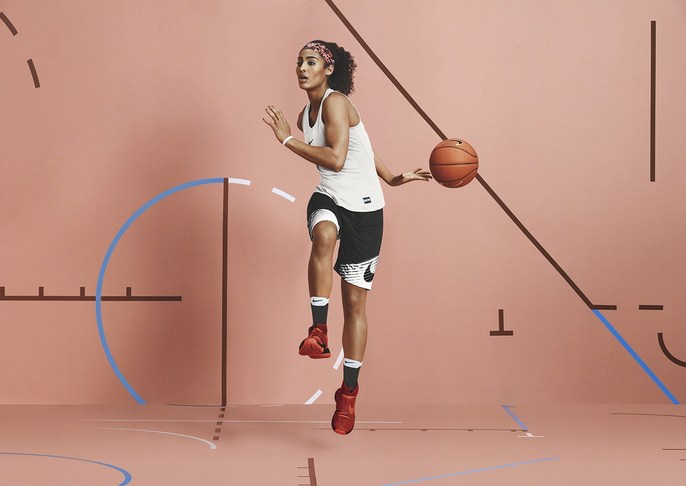 Athletic woman dribbling a basketball in a dynamic pose against a peach backdrop with geometric lines. Sports and fitness concept.