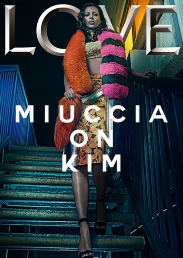 Fashion editorial image of a woman posing on metal stairs at night, wearing a skirt, crop top, fur scarf, and heels.