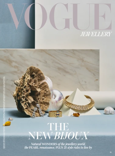 High jewelry still life editorial featuring gold necklaces, diamond earrings, and shells on structured blocks by Olivia Giles