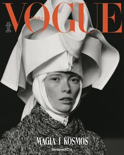 Vogue Polska cover featuring a woman with fair skin and light hair wearing a knit garment and a sculptural white headpiece.