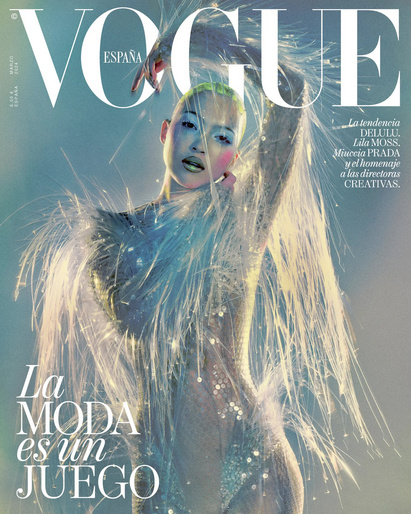 Model Lila Moss wearing feathered crystal garment on magazine cover styled by Jc Molina
