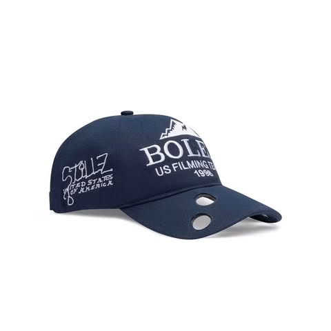 Navy blue baseball cap with white embroidered text and logo featuring a mountain peak design, complete with small vent holes in the bill.