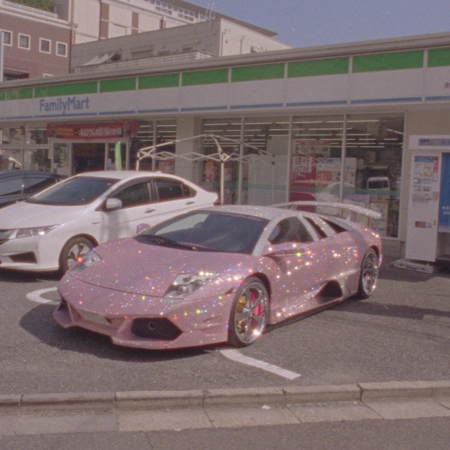 Sparkly pink Lamborghini parked in front of a Family Mart convenience store on a sunny day, with a white car also parked nearby.
